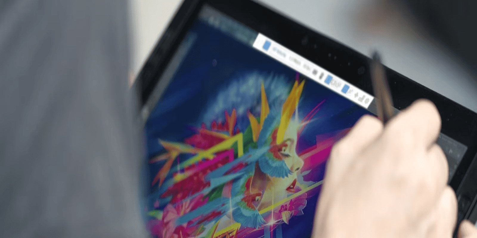 Tablet mostrando diseño colorido y vibrante